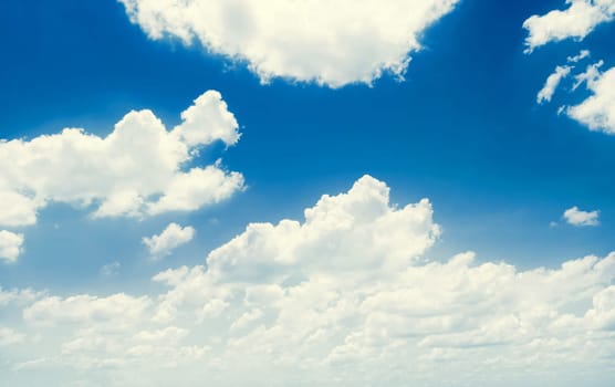 Blue sky, clouds and sun light background