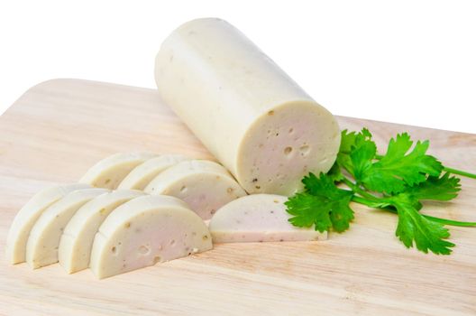 Vietnamese steamed pork sausage, a half roll and slices