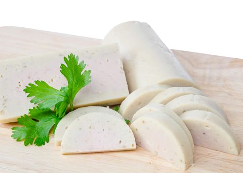 Vietnamese steamed pork sausage, a half roll and slices