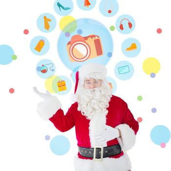 Happy santa with his hand out against dot pattern