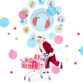 Santa pushing a shopping cart against dot pattern