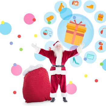Happy santa with sack of gifts against dot pattern