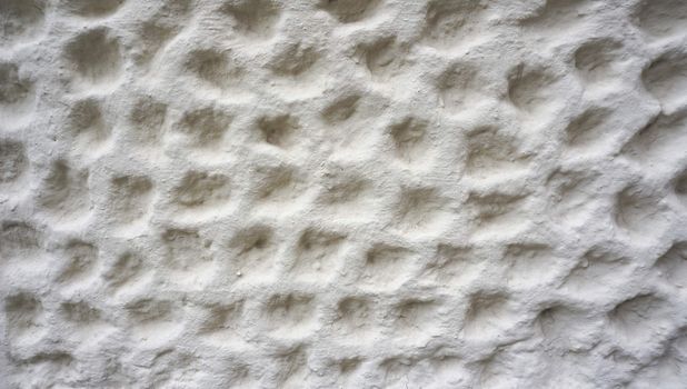 bubble texture on white cement wall finishing horizontal