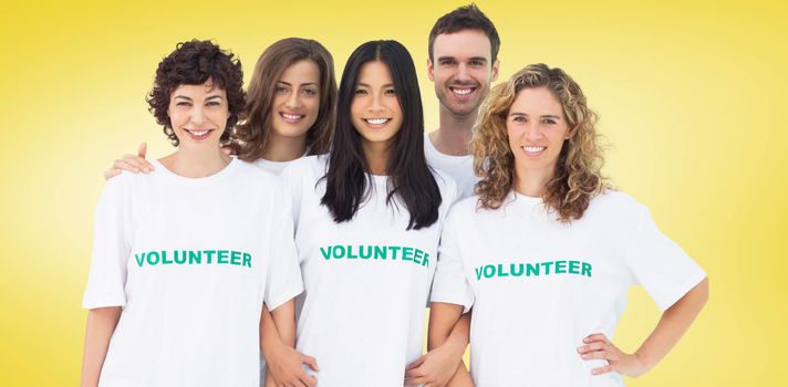 Group of people wearing volunteer tshirt against yellow vignette