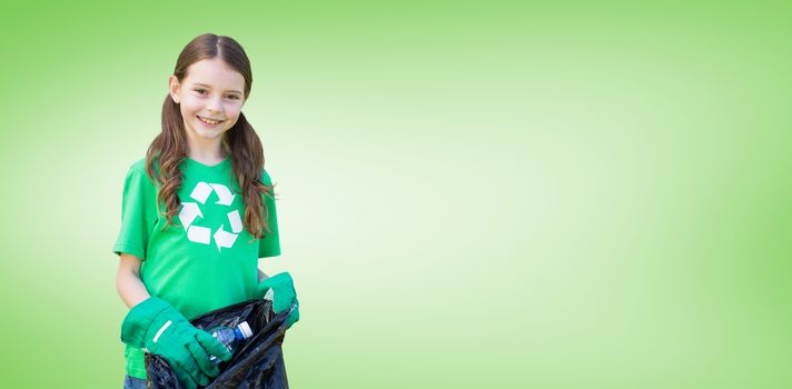 Happy little girl collecting rubbish  against green vignette