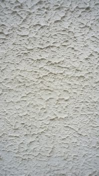 texture on white cement wall finishing vertical