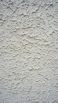 texture on white cement wall finishing vertical