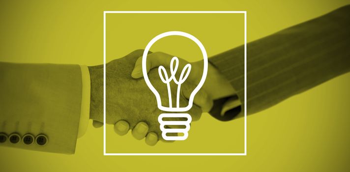 Business people shaking hands on white background against light bulb