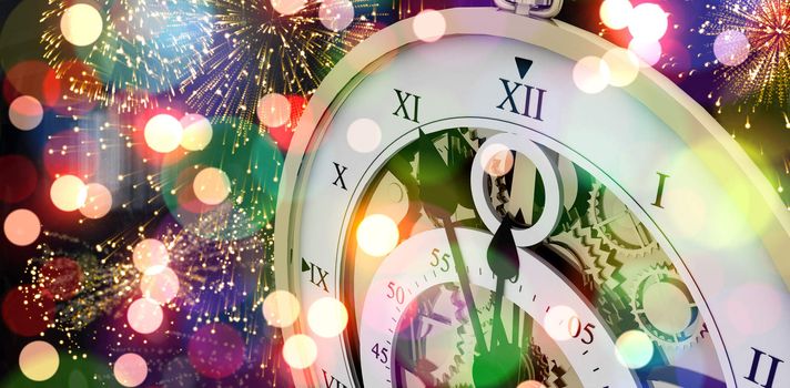 Close-up of old pocket clock against colourful fireworks exploding on black background