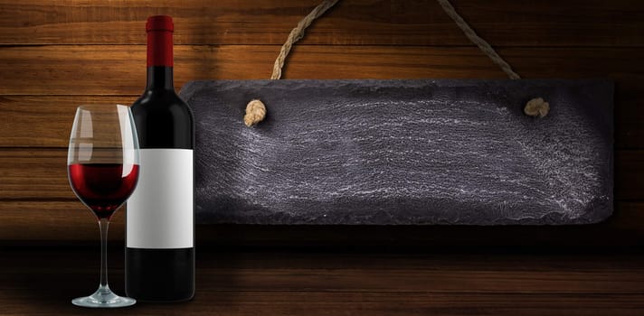 Red wine against overhead of wooden planks