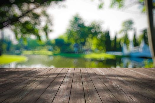 Perspective wood and bokeh light background. product display template