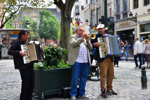 Brussels, Belgium - May 12, 2015: Street musician at Place d'Espagne (Spanish Sqaure) in Brussels, Belgium. on May 12, 2015.