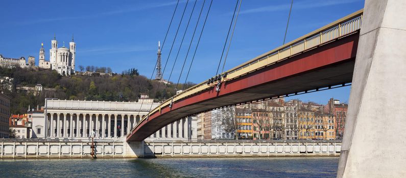 Panoramic view of Saone river at Lyon with red footbridge, France