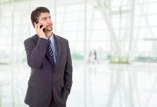 young business man on the phone, at the office