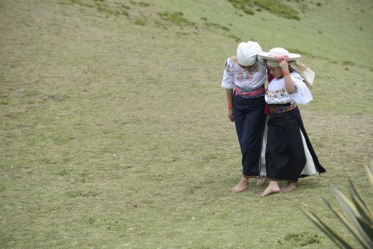 Cochasqui, Ecuador, - June, 2013. Two American Indians in traditional Ecuadorian costumes are having a rest between the participation in Solstice holiday. Their dancing is an important  part of the whole performance, in which shamans from different tribes of Latin America are participating.







Inti Raymi celebration








An Indian woman in traditional costume.