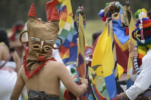 Archeological park Cochasqui, Ecuador, - June21, 2013.
The celebration of the summer solstice holiday, called Inti Raimy is held every end of the June (21-22) in the countries of Latin America like Peru and Ecuador.
 People are wearing the masks, dancing, and singing to praise the sun.