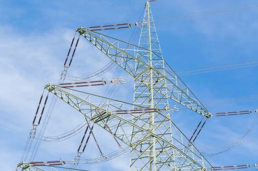 Pylon. Power line against sky background.