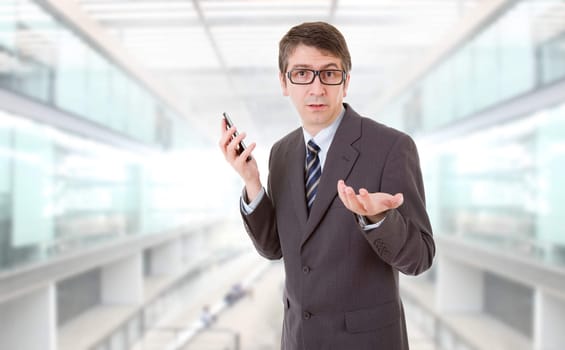 young business man on the phone, at the office