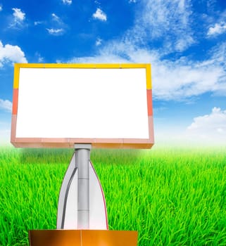 Blank billboard on blue sky and field grass for your advertisement