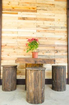 Wooden Table And Chair Set on wooden background. In the public park.