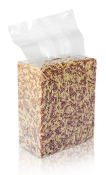 Brown rice in vacuum plastic bag on white background. 1 Kg.