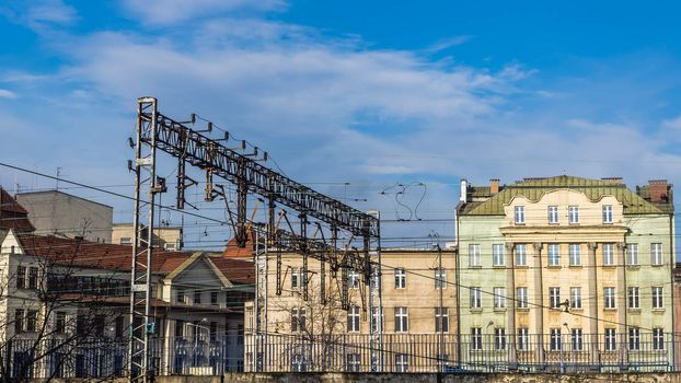 Cityscape of Katowice, Silesia region, Poland, with old tenements preceded by the railroad.