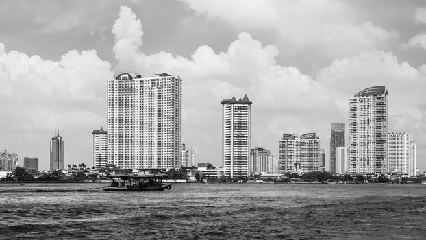 Cityscape of Bangkok, capital of Thailand. The city occupies 1.568 square kilometers in the Chao Phraya River with a population of over 8 million inhabitants.