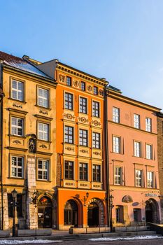Ancient tenements in the Old Town of Krakow, the most popular destination in Poland, full of numerous attractions for tourists.