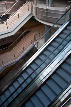 escalators and stairs in a modern office building