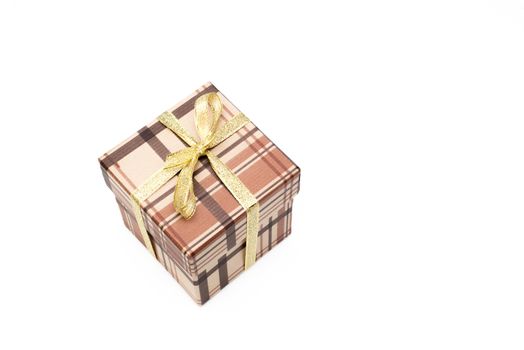 brown gift box with bow on white background