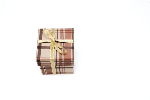 brown gift box with bow on white background