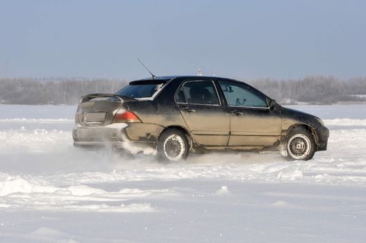 Car cornering spray snow