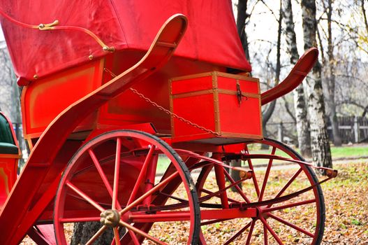 details of the red horse carriages