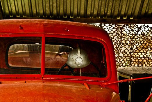 front of red oldtimer truck cabin