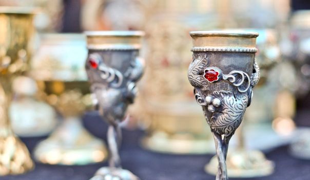 vintage metal goblet with a red gem