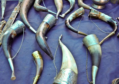 original drinking horns antique on blue cloth