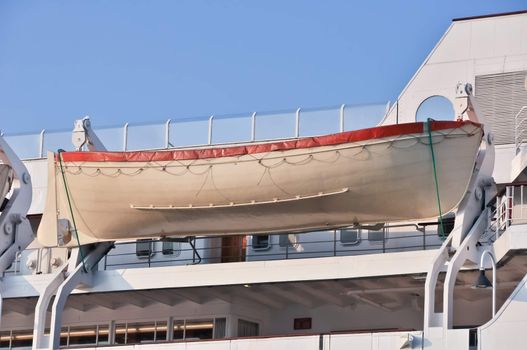 the large lifeboat aboard a cargo ship