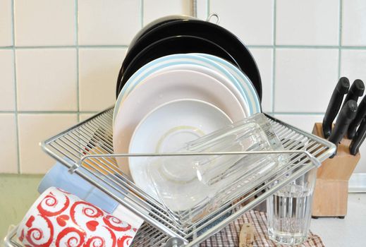 the clean dishes on the rack