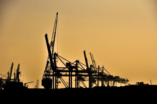 sea cargo port in dusk  - contrast skyline