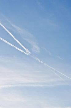 blue sky with traces of planes