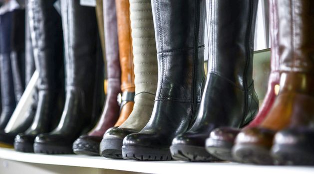 women's boots on the shelves in the store