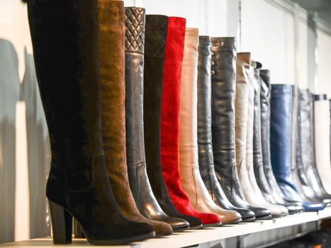 women's boots on the shelves in the store