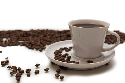 The photo shows a cup of coffee on a white background