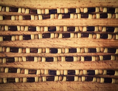 background retro wooden beads on a wooden board