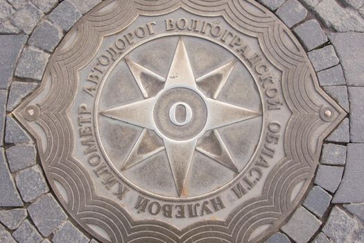 Volgograd, Russia - October 10, 2015: Sign of the zero kilometer of highways Volgograd Region, established on 12 September 1998 at Volgograd Square of Fallen Fighters from the area Demonstrations