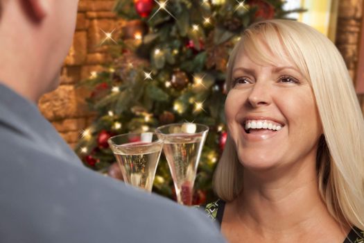 Pretty Girl Socializing with Champagne Glass At Christmas Party.