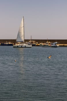 Sail boat in the Tomis harbor in Constanta Romania at the Black Sea