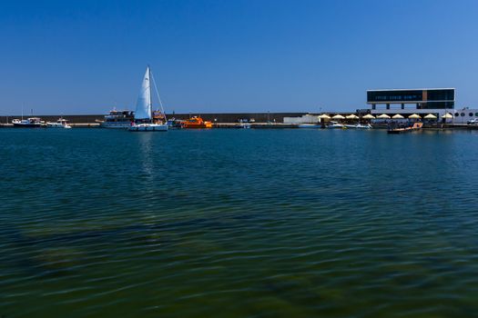 Sail boat in the Tomis harbor in Constanta Romania at the Black Sea