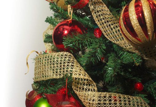 christmas tree branchs with balls on white background