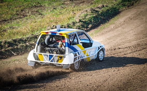 Car during a "stock car cross" race. The league called "stock car cross" foresees the use of tuned cars on unpaved circuits.